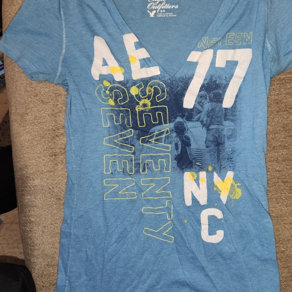 Blue Graphic Tee with Yellow Accents